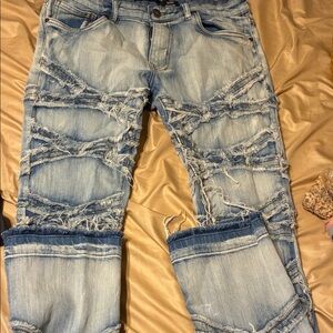 Distressed Light Blue Jeans